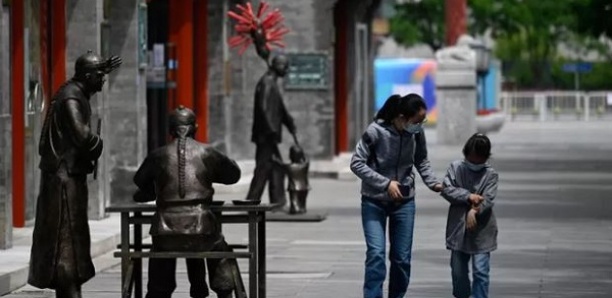 Nouvelles restrictions à Pékin, aux airs de ville fantôme